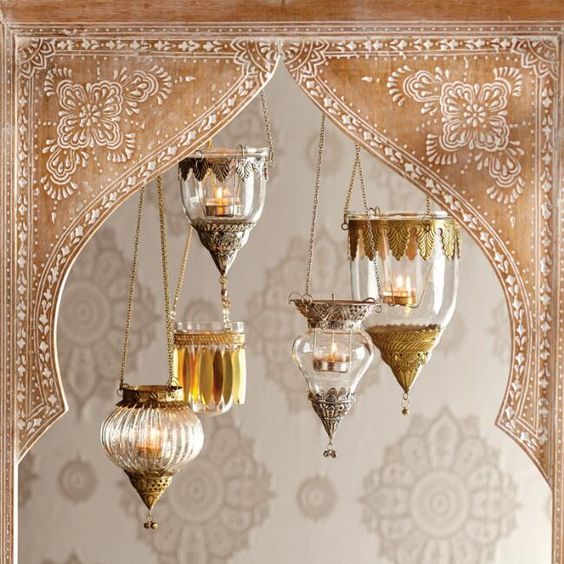 Cute vintage lanterns lend an aesthetic value to your puja room design
