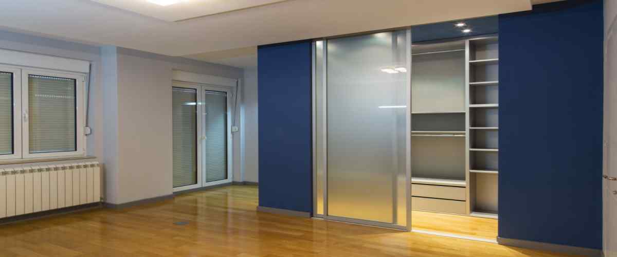 A Wardrobe with a Glass design on One Side