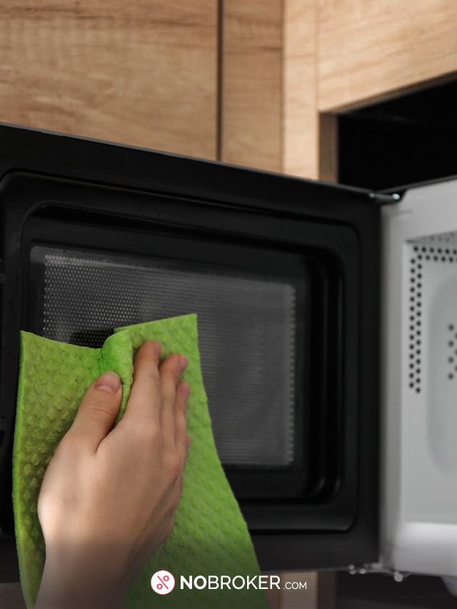 https://www.nobroker.in/blog/wp-content/uploads/2023/11/A-Quick-Easy-Guide-to-Cleaning-Your-Microwave-Oven.jpg