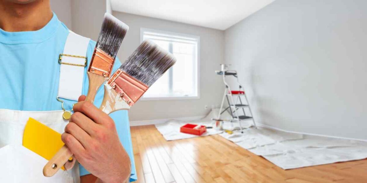 1 bhk room painting with painter hand with painting brush