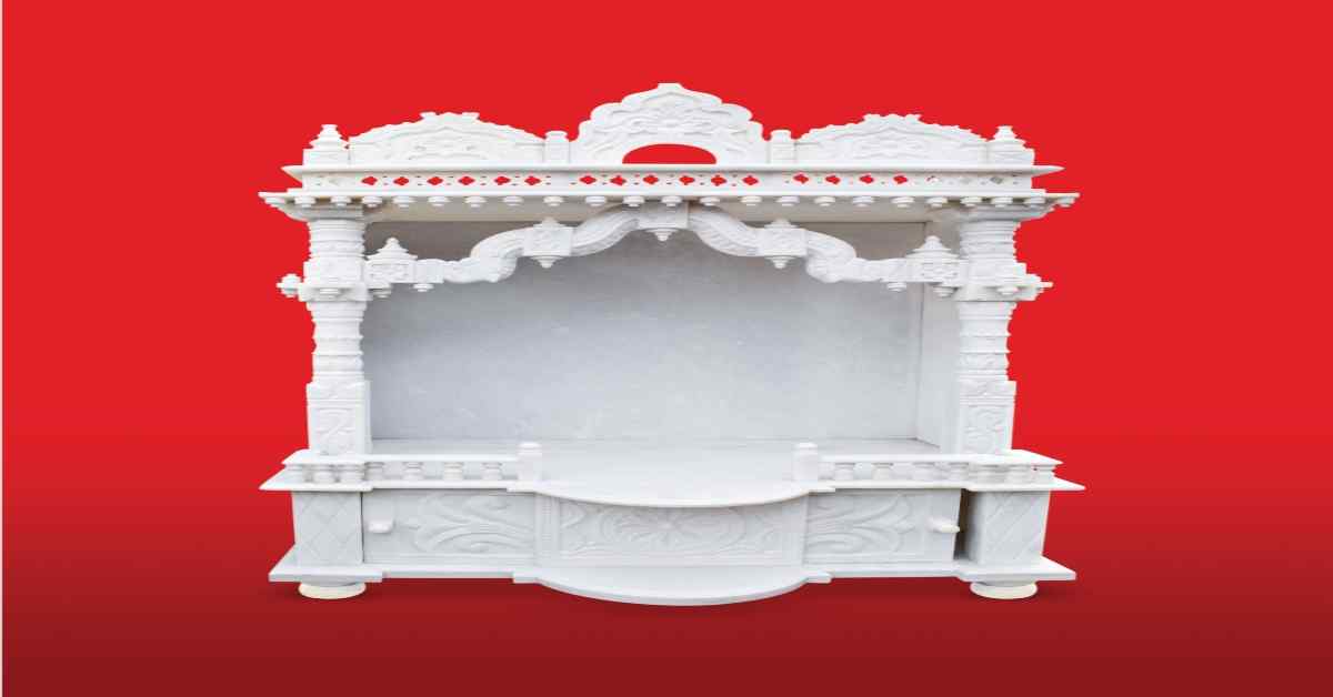 marble pooja mandir with metal accents
