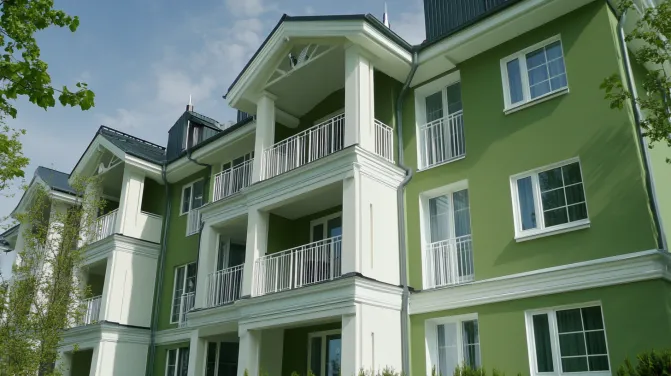 sage green and white apartment exterior colour combination